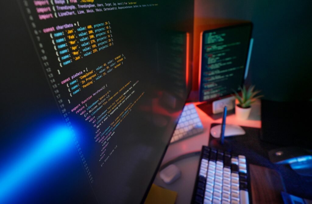Developer coding on a laptop with modern technology tools